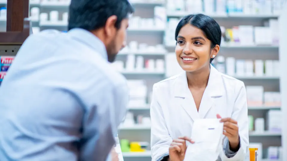 Pharmacist engage with customers